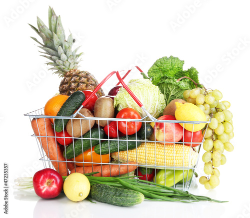 Fresh vegetables and fruits in metal basket isolated on white