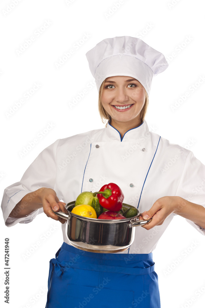 Chef in hotel or restaurant kitchen cooking