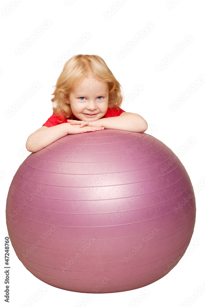 blond baby with blue eyes smiling and playing with fitness ball blond baby with blue eyes smiling and playing with fitness ball