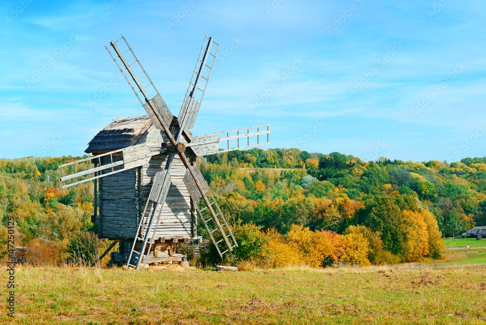 Fototapeta premium Old windmills on a picturesque hill
