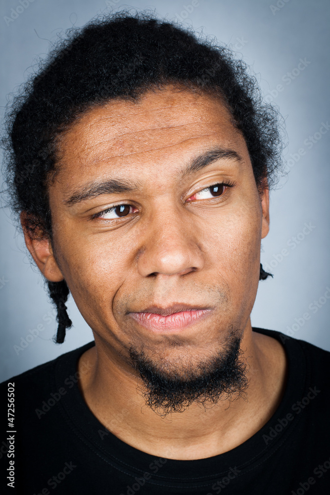 Obraz premium Portrait of young man with emotional facial expression