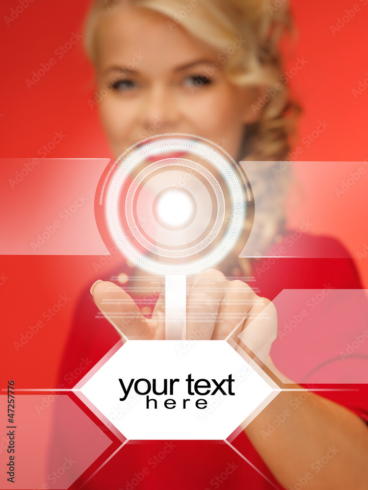 woman in red dress pressing virtual button woman in red dress pressing virtual button
