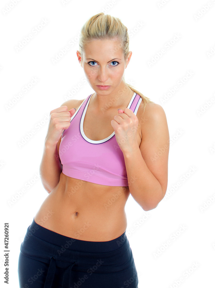 Young female fitness trainer holding fists up. Isolated on white Young female fitness trainer holding fists up. Isolated on white