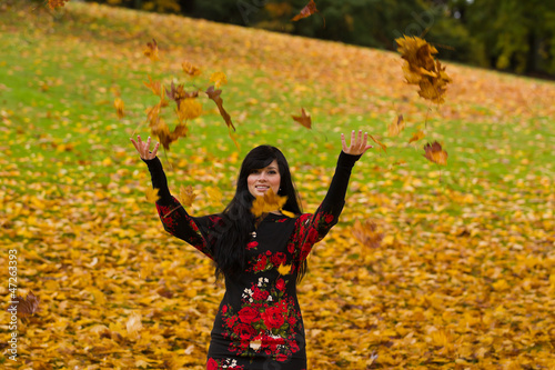 Beautiful elegant young woman and autumn colors.