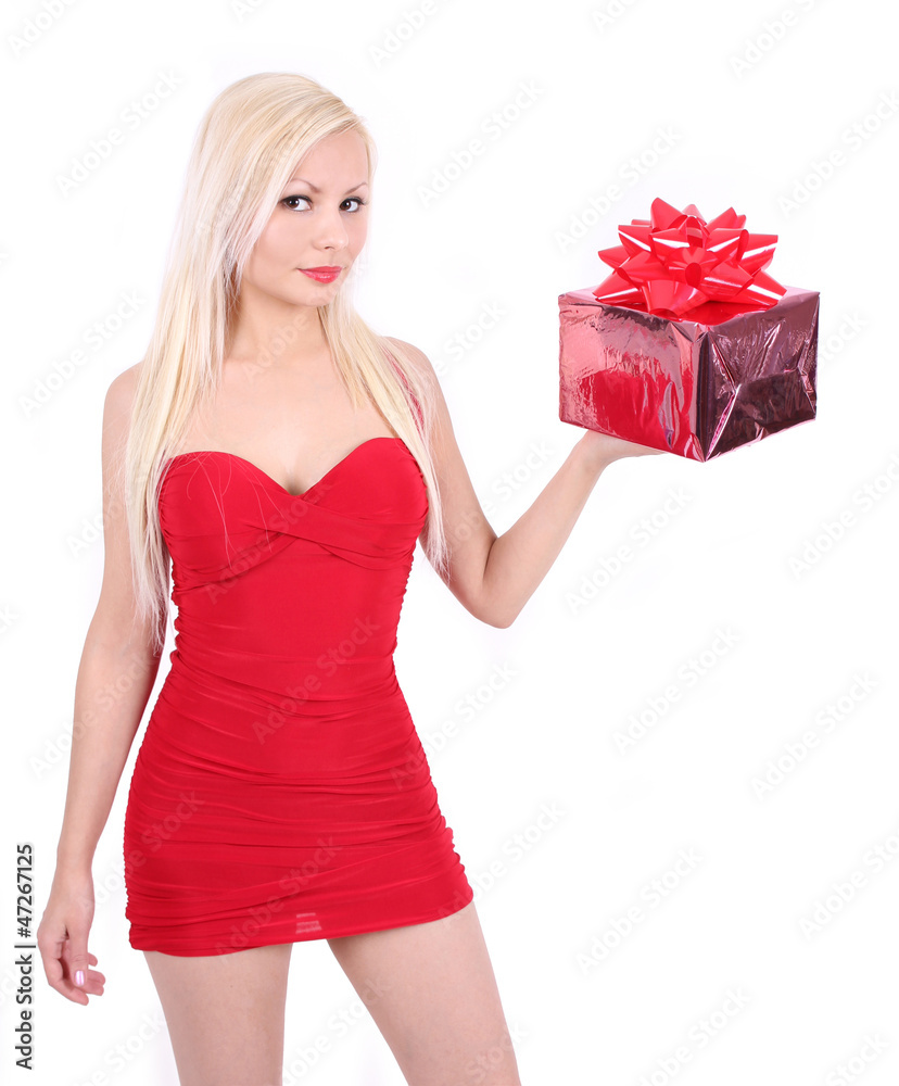 blond girl in red dress holding Christmas gift box isolated blond girl in red dress holding Christmas gift box isolated