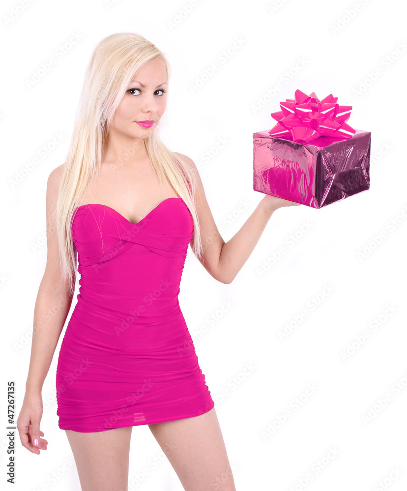 blond girl in pink dress holding Christmas gift box isolated blond girl in pink dress holding Christmas gift box isolated