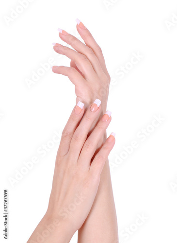 beautiful hands with french manicure isolated on white