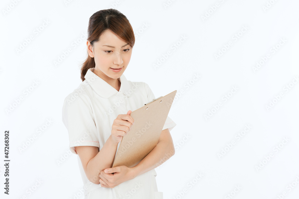 Beautiful young nurse on white background Beautiful young nurse on white background