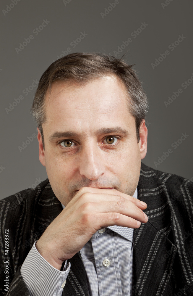 portrait of adult man isolated on dark background portrait of adult man isolated on dark background