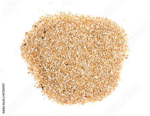 Pearl barley heap isolated on white