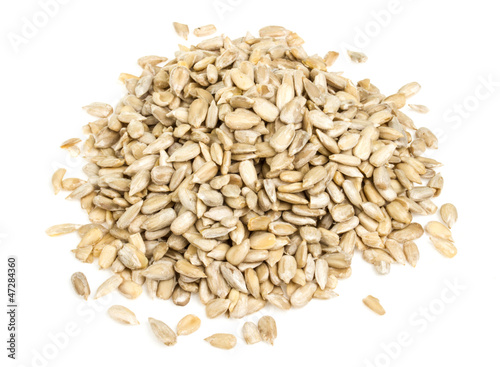 fresh sunflower seeds isolated on a white background
