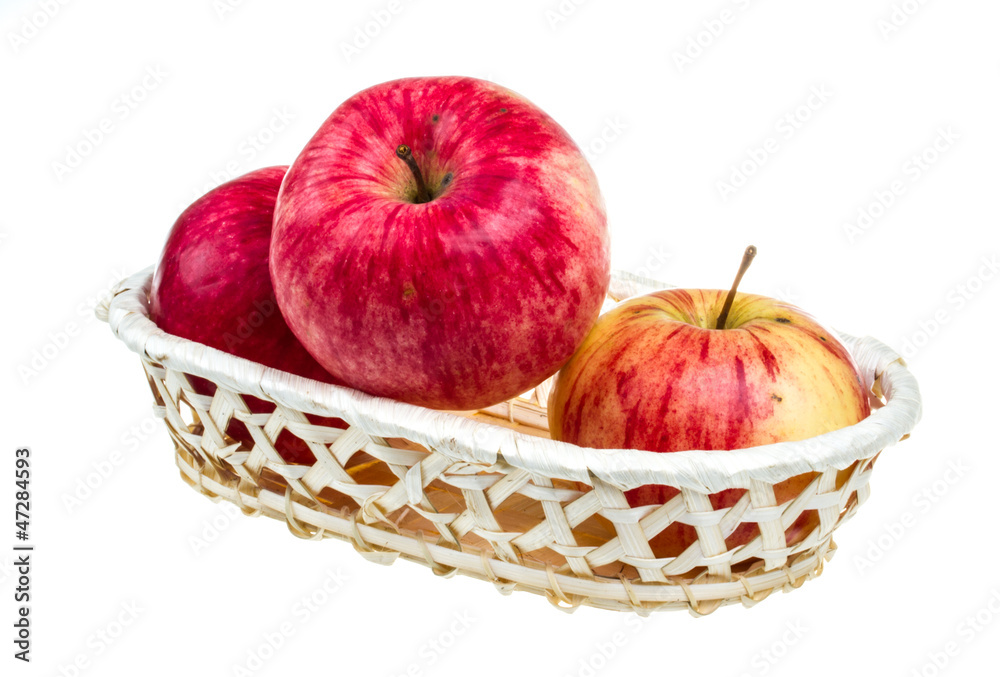fresh red apples in the dish isolated on white background