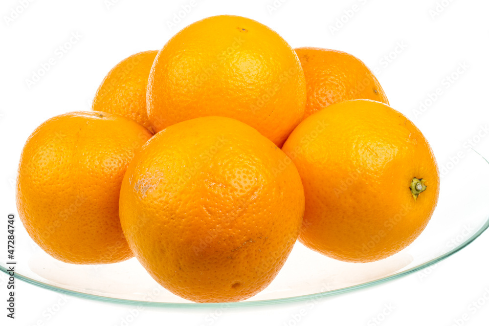 Heap of oranges in the dish Heap of oranges in the dish