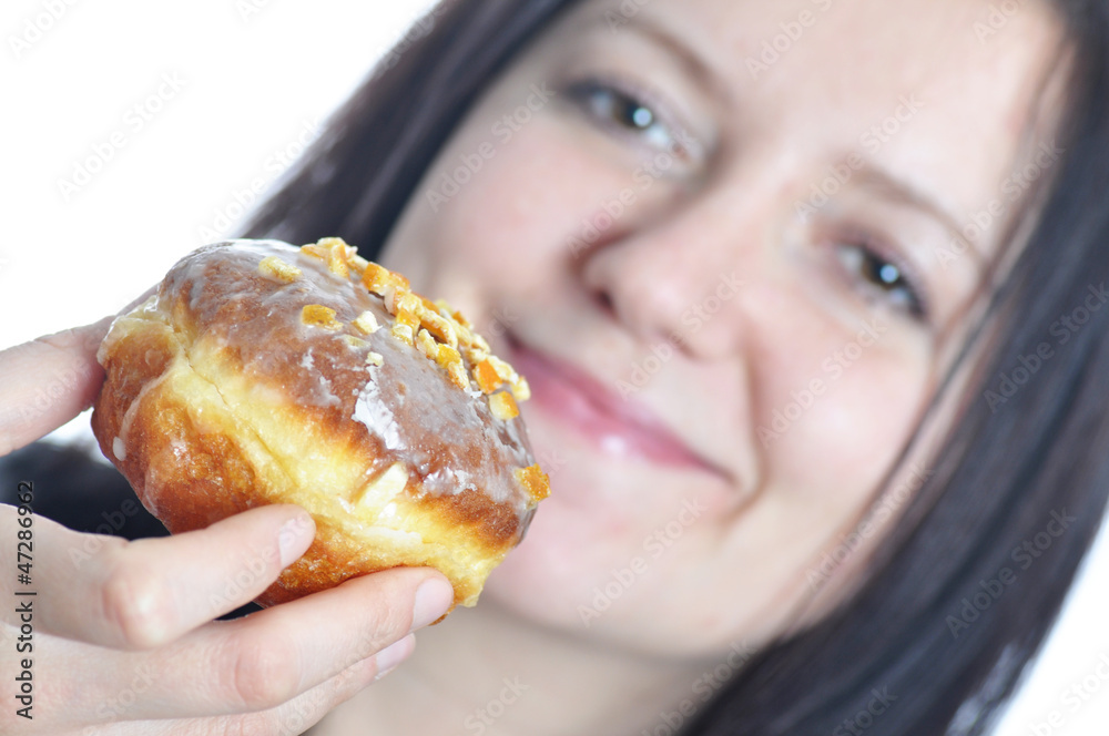 portrait of a young woman eating a donut portrait of a young woman eating a donut