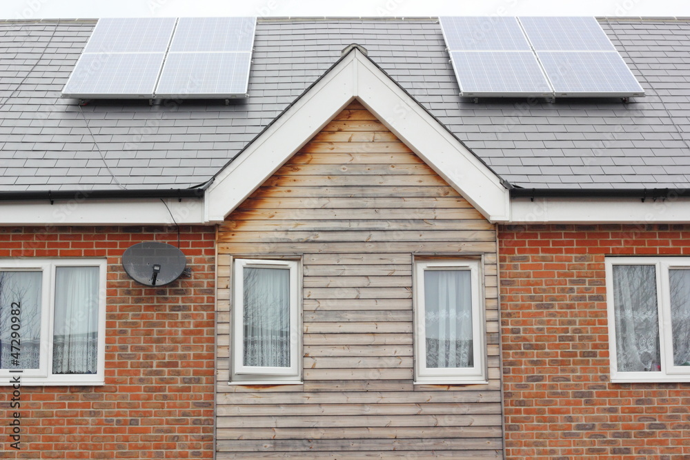 solar energy panels on the roofs of residential homes