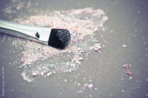 pink eyeshadow powder and brush