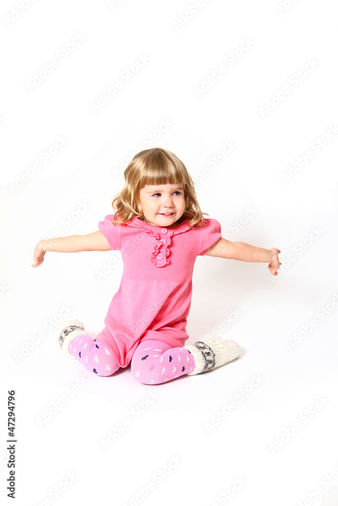 Happy little girl laughing isolated on white background