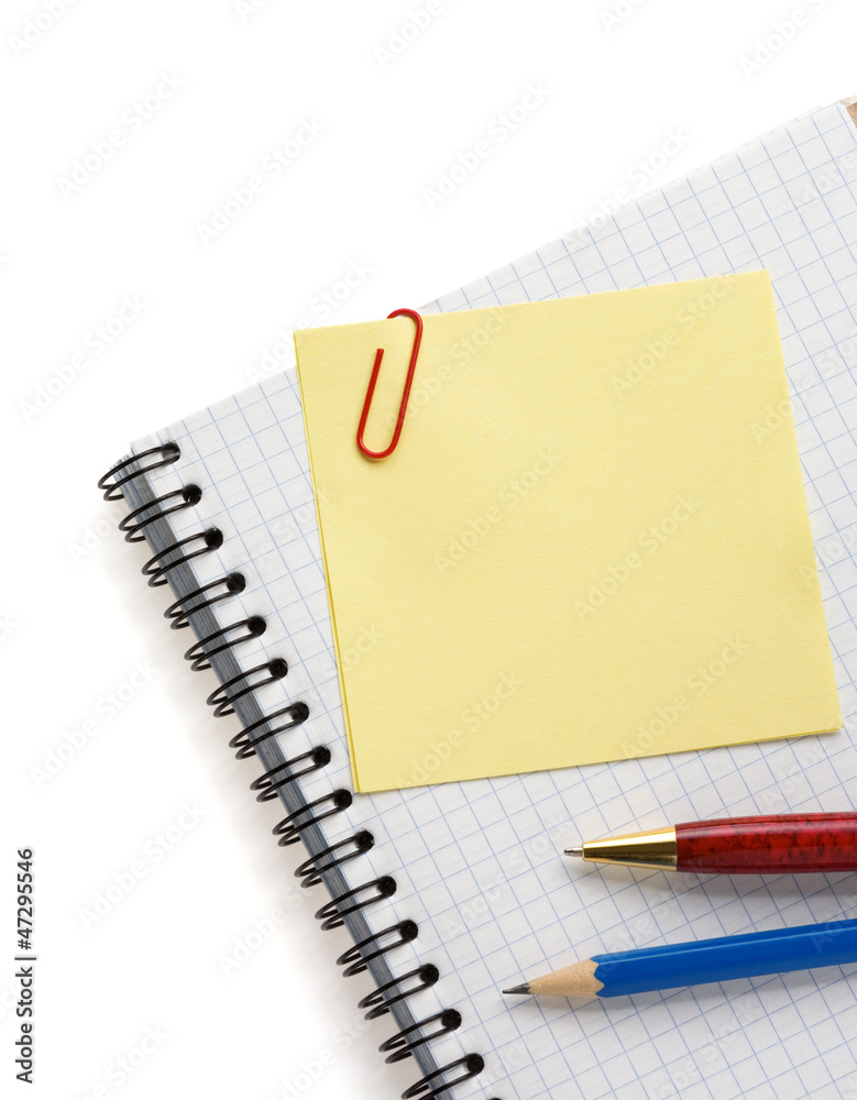 note paper and notebook on white note paper and notebook on white