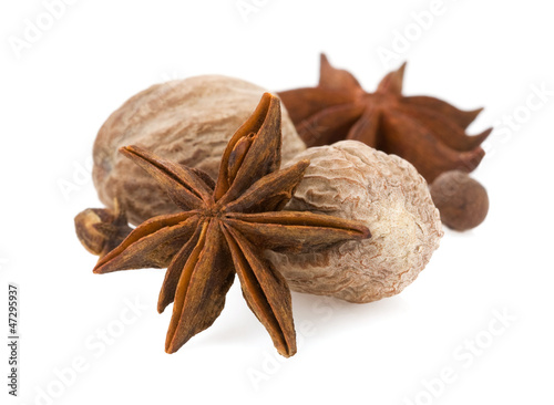 anise star and nutmeg on white