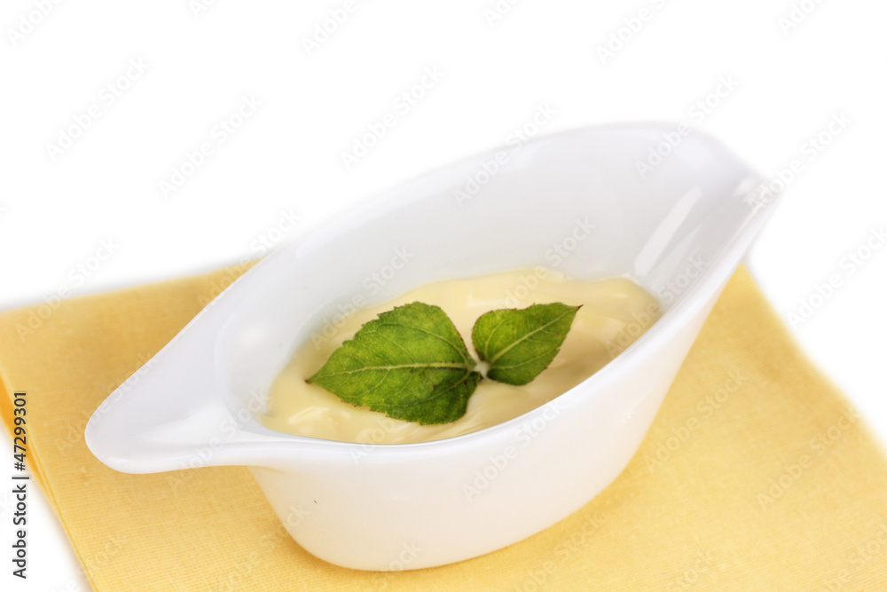 Mayonnaise in bowl on napkin isolated on white Mayonnaise in bowl on napkin isolated on white