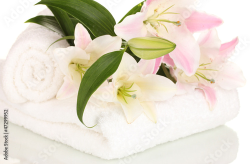 Fototapeta Naklejka Na Ścianę i Meble -  beautiful lily on towel isolated on white