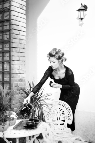 sexy woman posing as an aristocrat - fashion shoot