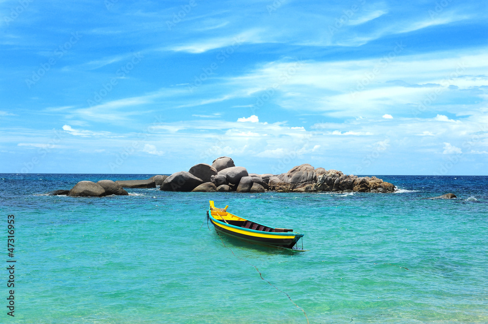 Yellow boat in the turquoise tropical sea, Koh Tao, Thailand Yellow boat in the turquoise tropical sea, Koh Tao, Thailand