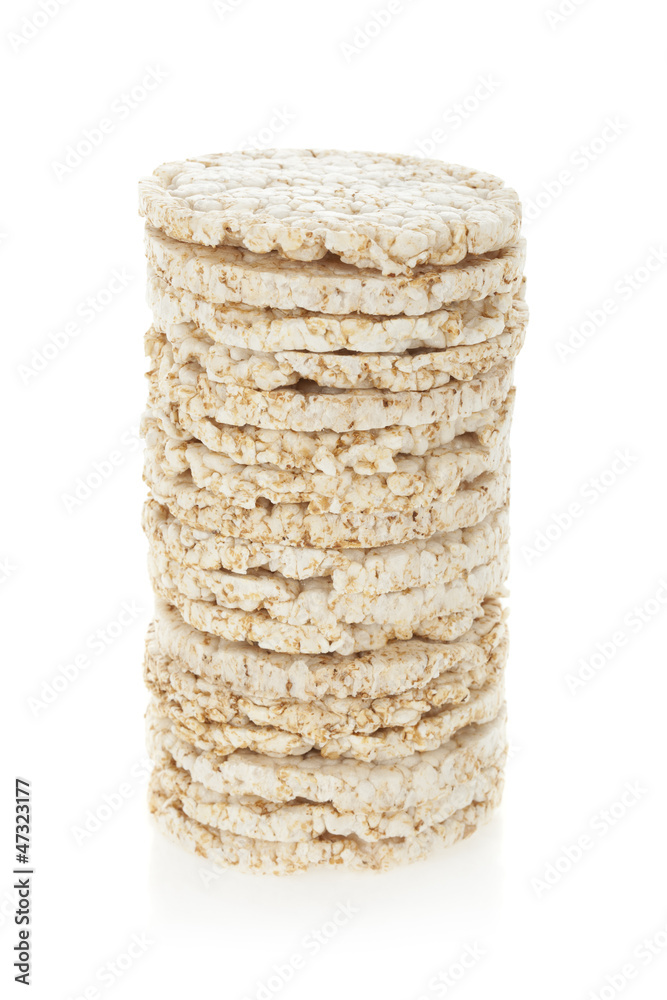 Diet rice cakes pile isolated on white background.
