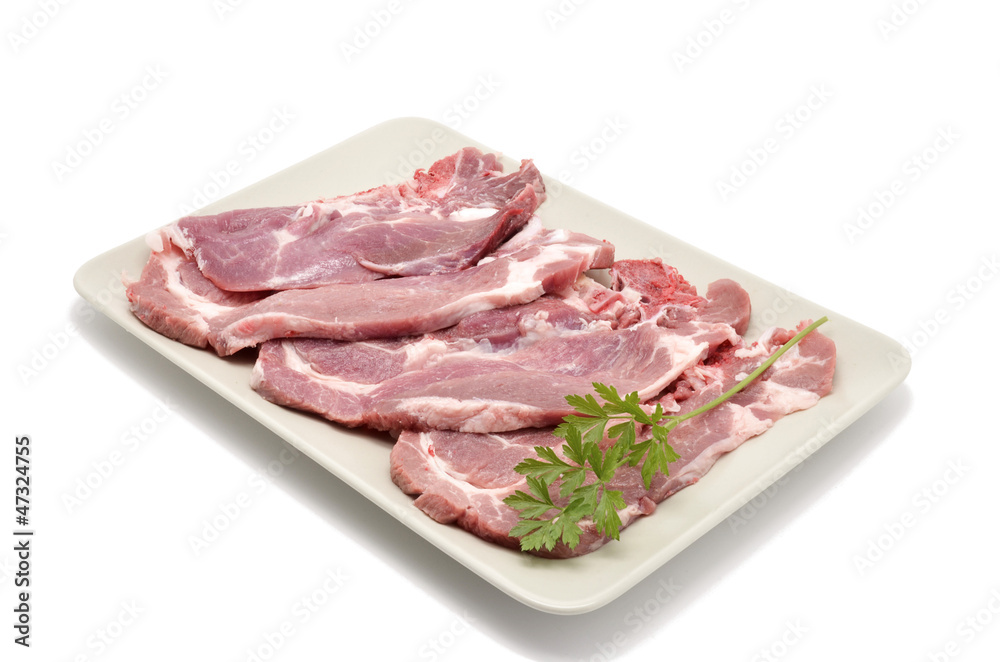 raw pork chops with parsley