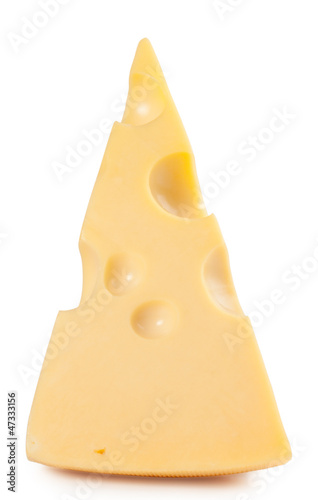 A delicious piece of cheese isolated on a white background