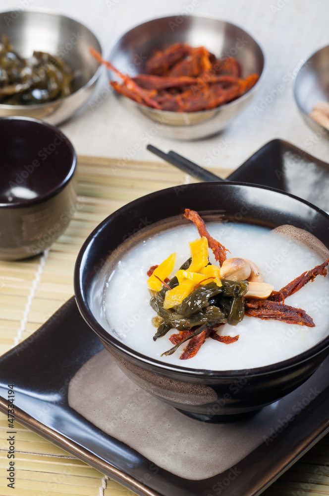 congee with dried beef, peanuts, preserve turnips and sea weeds congee with dried beef, peanuts, preserve turnips and sea weeds