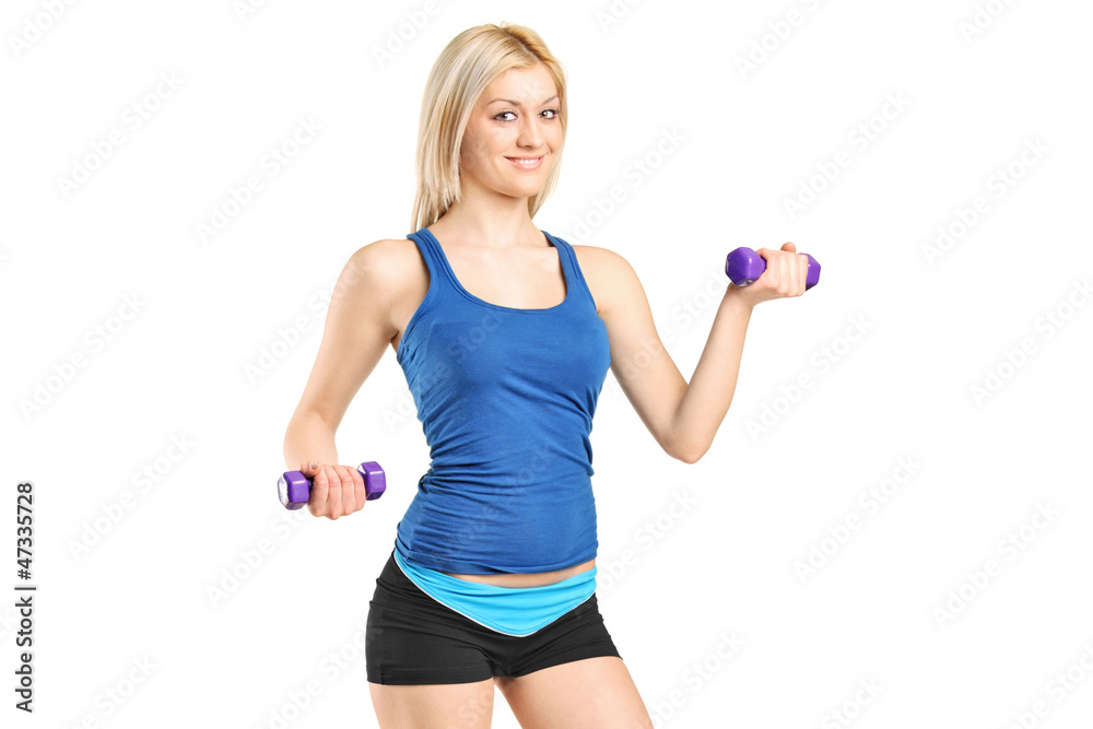 Attractive young woman exercising with weights Attractive young woman exercising with weights