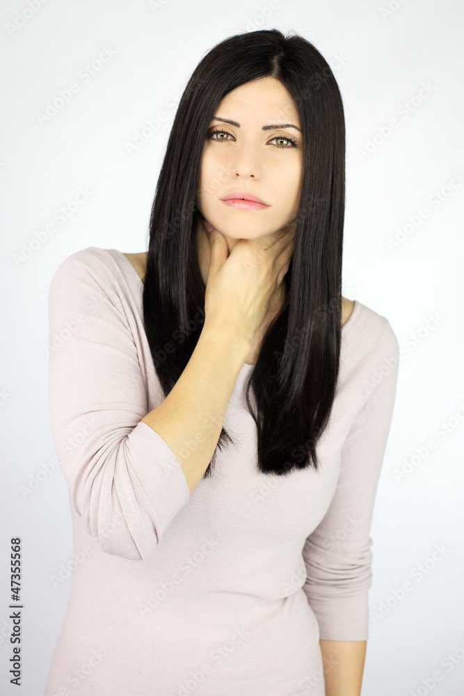 Serious beautiful woman sick with throat problem sore Serious beautiful woman sick with throat problem sore