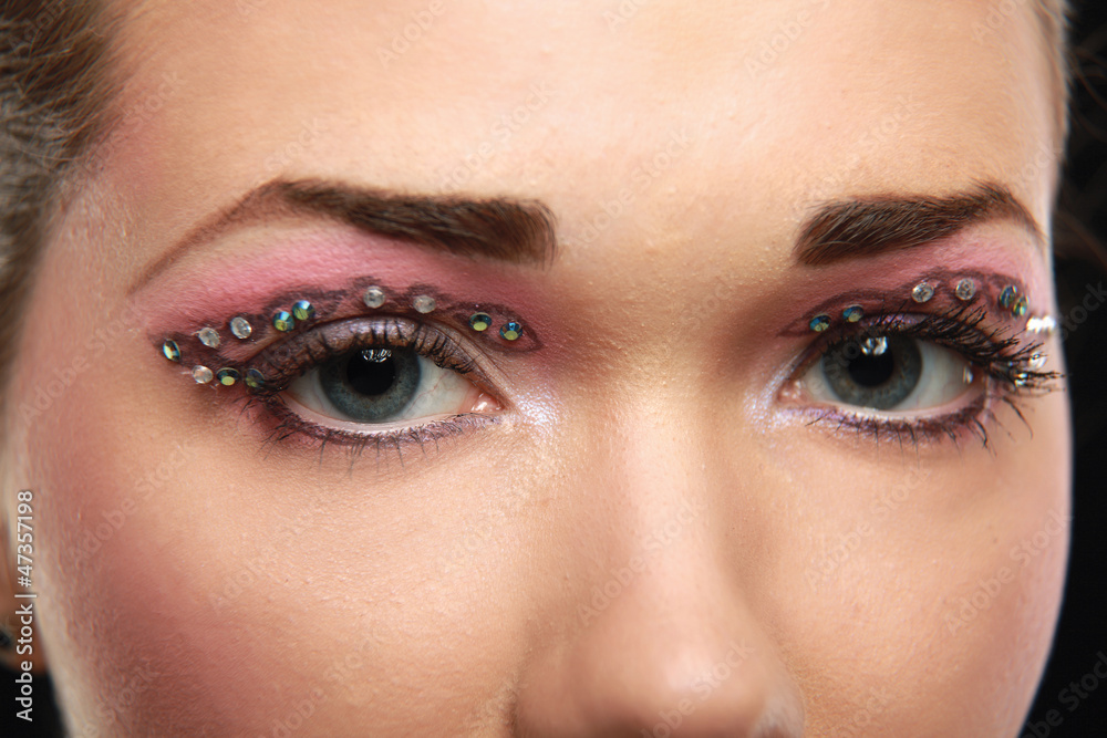 Fototapeta premium Woman eye with exotic style makeup