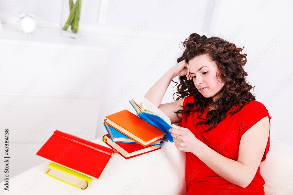 Woman with colorful books