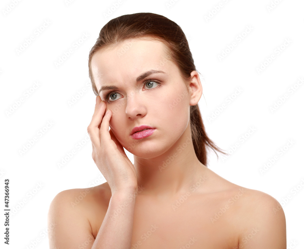 portrait of young beautiful woman having a headache against portrait of young beautiful woman having a headache against