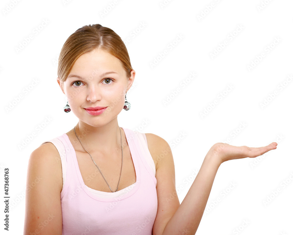 A beautiful young girl holding something A beautiful young girl holding something