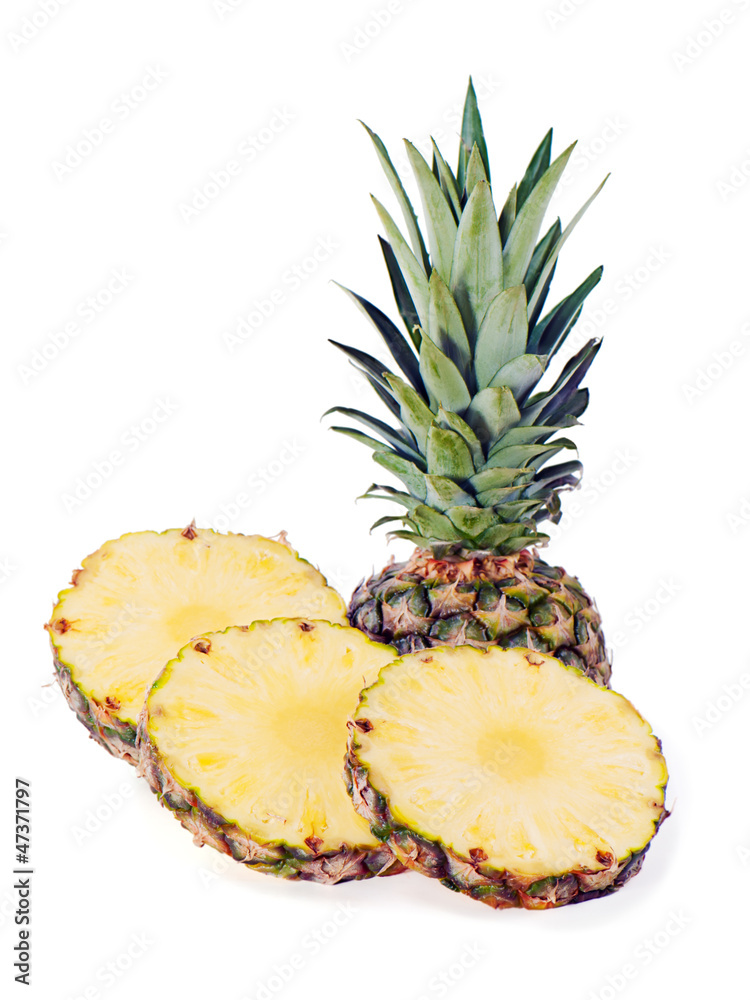 ripe pineapple with slices isolated on white background ripe pineapple with slices isolated on white background