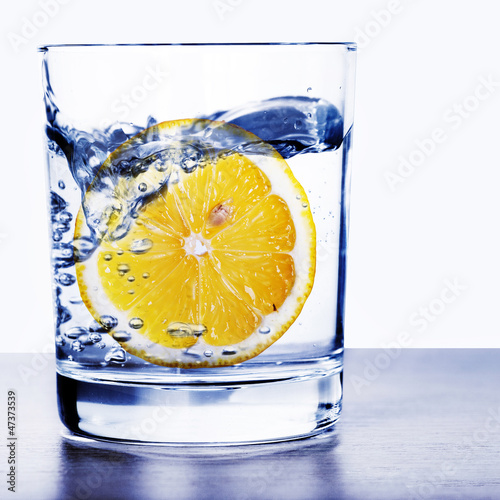 Glass of water with lemon #47373539