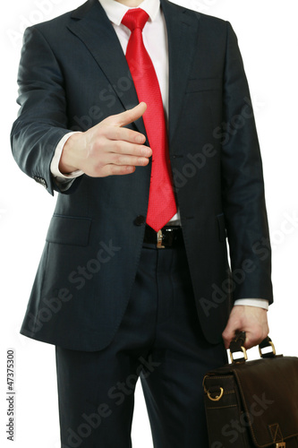 A young businessman giving his hand for a handshake