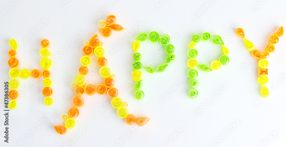 The word happy is made of quilling isolated on white The word happy is made of quilling isolated on white