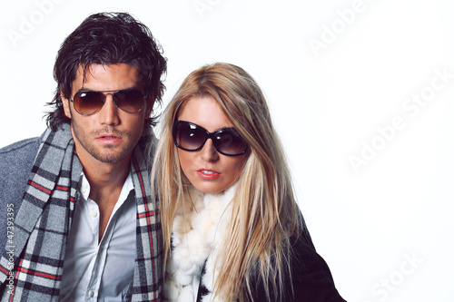 Couple of fashion models with sunglasses