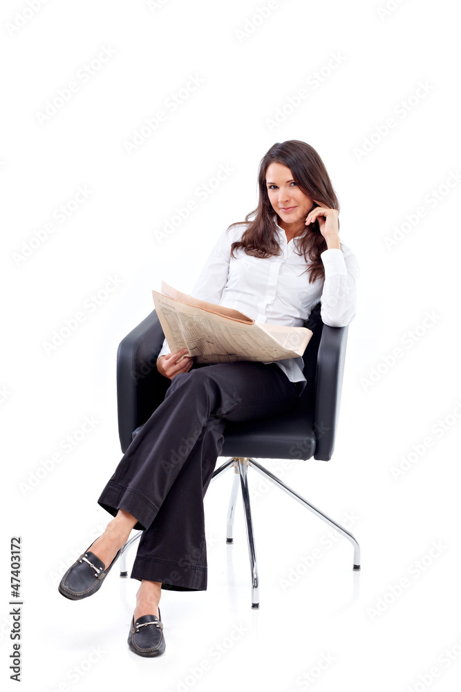 Casual 20s woman reading stock rates in newspaper 7 Casual 20s woman reading stock rates in newspaper 7