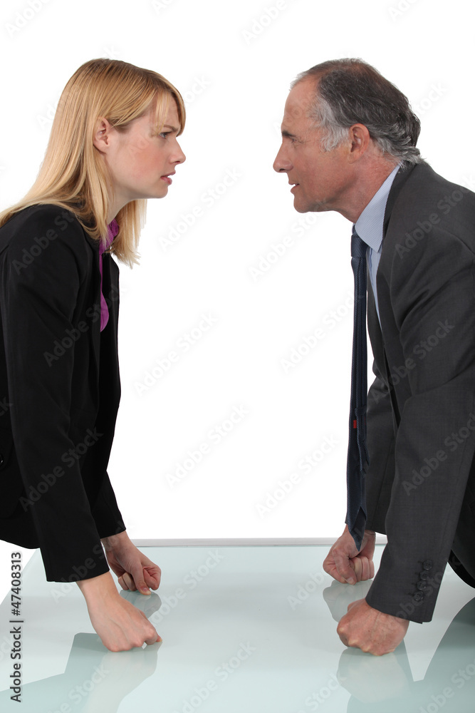 businessman and businesswoman having a quarrel businessman and businesswoman having a quarrel