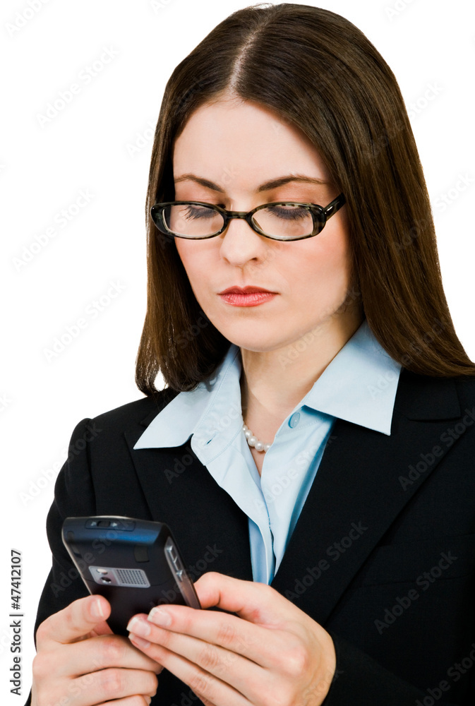 Gorgeous businesswoman text messaging Gorgeous businesswoman text messaging
