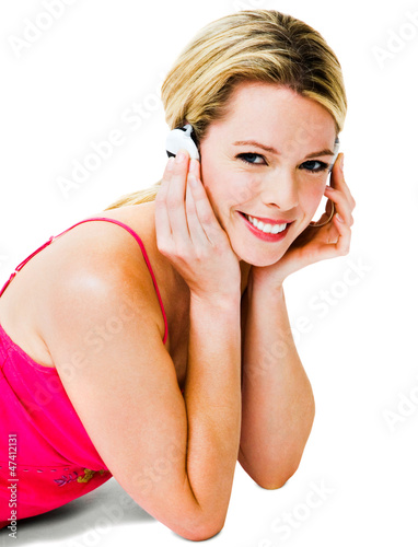 Portrait of a woman listening music