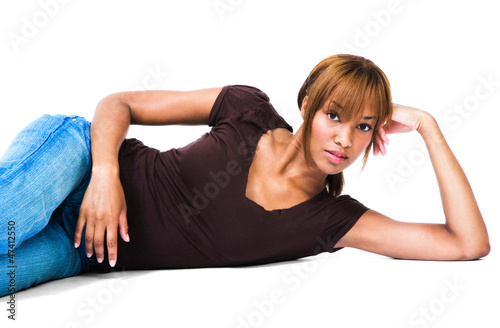 Young woman leaning on floor