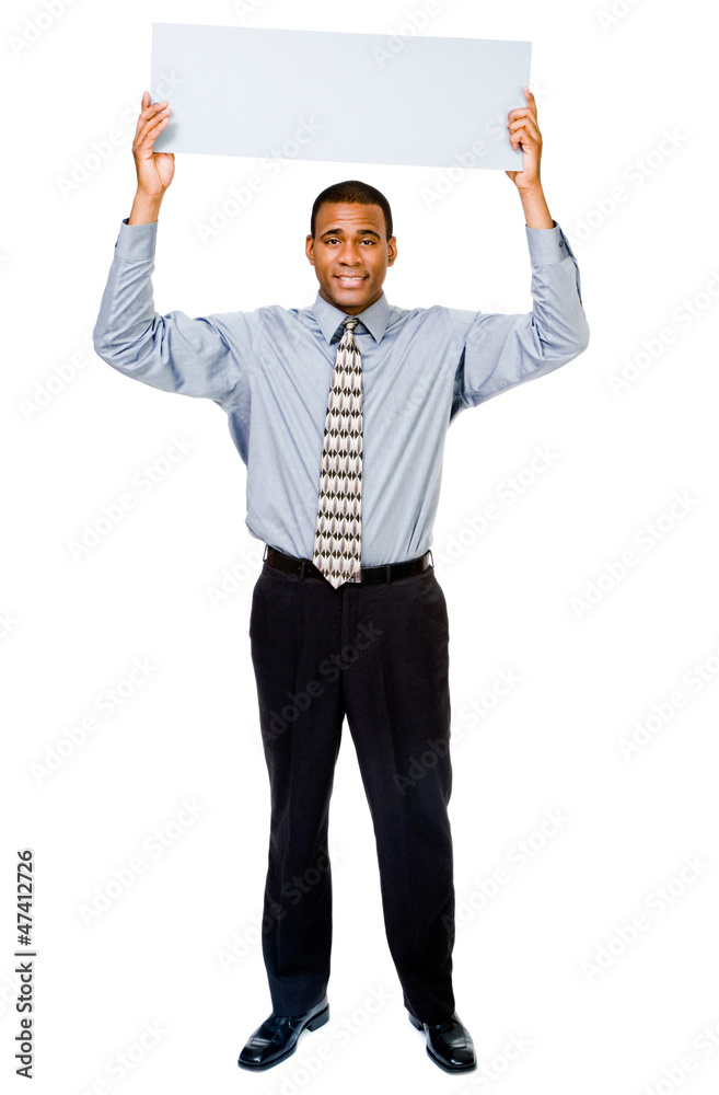Happy businessman showing placard Happy businessman showing placard