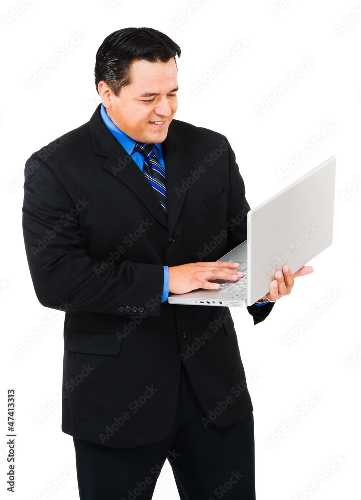 Happy businessman working on laptop Happy businessman working on laptop