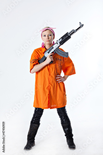 Young woman with automatic rifle © adasvasiliauskas